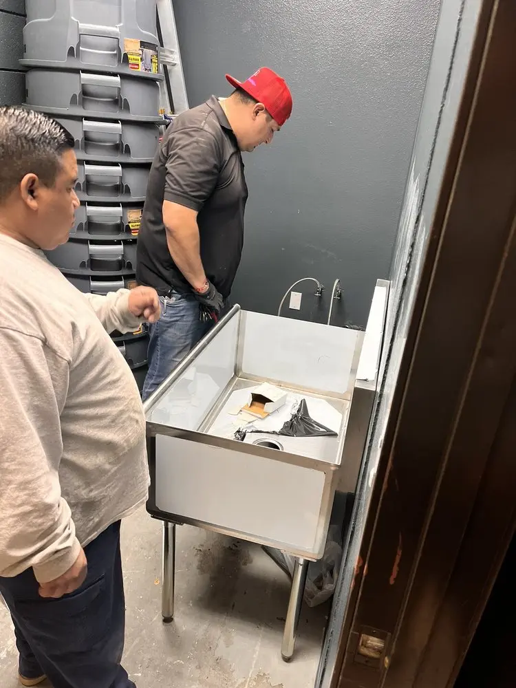 Commercial plumbing and sink installation in Burnett